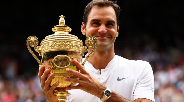 Federer and his Wimbledon trophy. Image: Getty