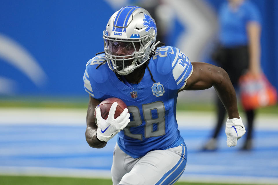 FILE - Detroit Lions running back Jahmyr Gibbs (26) warms up before the first half of a preseason NFL football game between the Detroit Lions and the Jacksonville Jaguars, Saturday, Aug. 19, 2023, in Detroit. he Detroit Lions are counting on running backs David Montgomery, in his fifth season, and rookie Jahmyr Gibbs to give them a strong ground game for the second straight year. (AP Photo/Paul Sancya, File)
