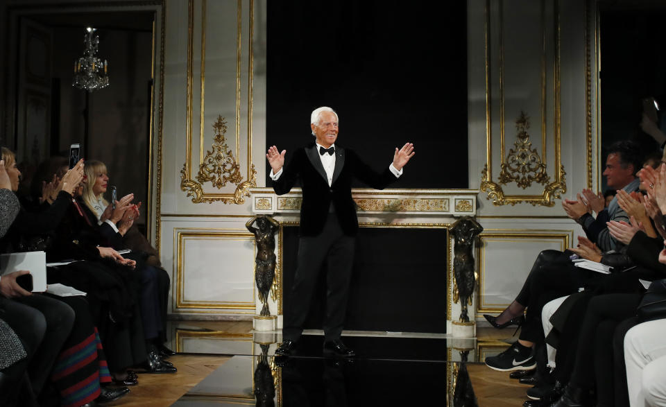 Designer Giorgio Armani accepts applause after his Spring/Summer 2019 Haute Couture fashion collection presented in Paris, Tuesday Jan. 22, 2019. (AP Photo/Francois Mori)