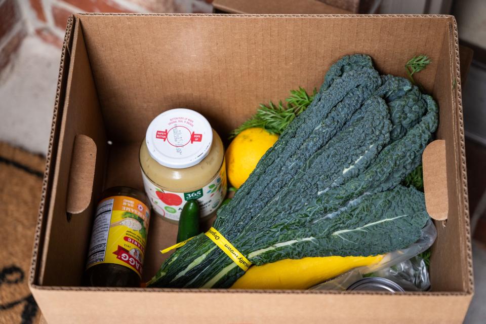 The Farmshare Austin box contains chard, squash, oranges and carrots, as well as some shelf-stable items.