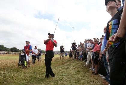 Tiger Woods plays a shot along the 12th fairway during the final round of the British Open. (AP)