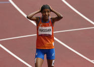 Sifan Hassan, of Netherlands reacts after winning a women's 1,500-meter heat at the 2020 Summer Olympics, Monday, Aug. 2, 2021, in Tokyo, Japan. (AP Photo/Charlie Riedel)