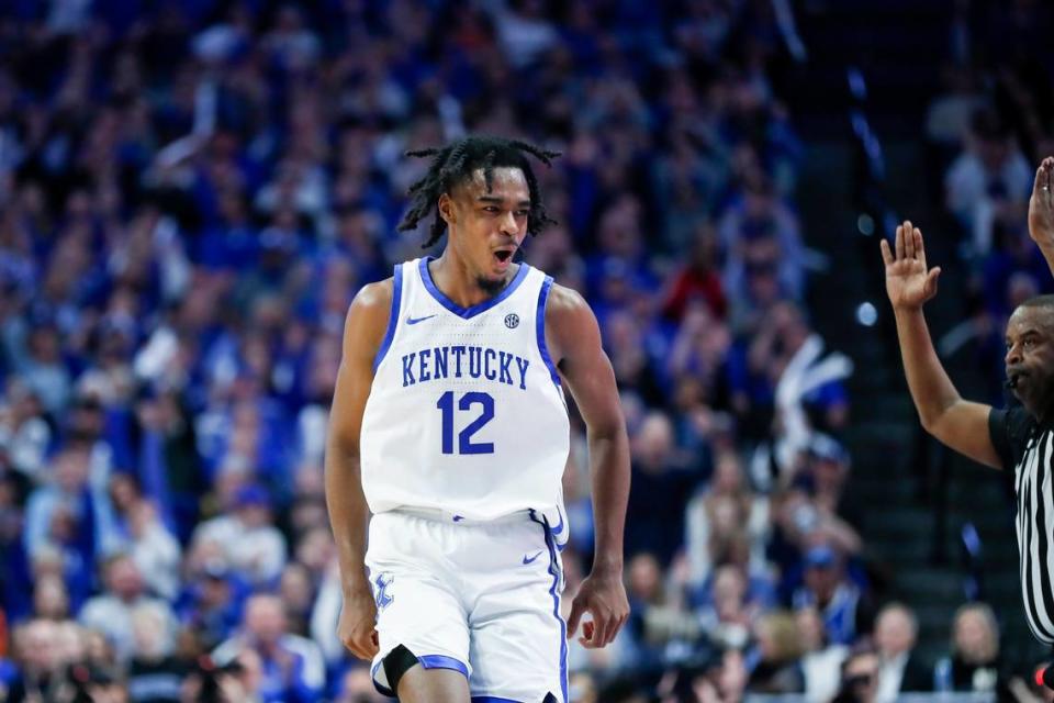 Kentucky guard Antonio Reeves celebrates making a three-pointer against Auburn during the second half at Rupp Arena. Reeves scored 18 of his 21 points after the break.