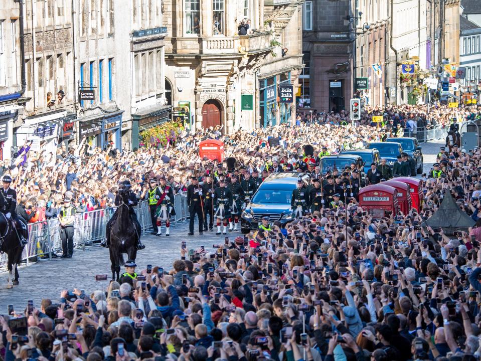 The hearse carrying Queen Elizabeth II’s coffin as it moves along Edinburgh’s Royal Mile (Getty)