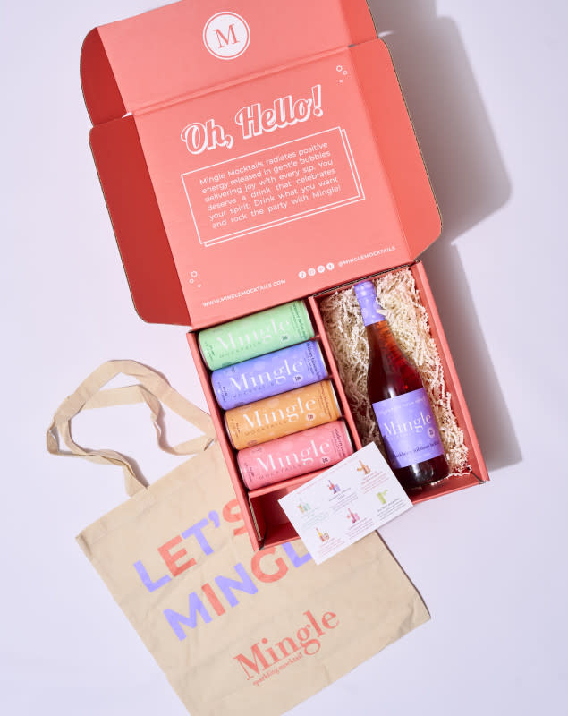 <p>Courtesy of Mingle Mocktails</p><p>Mingle’s new <a href="https://www.minglemocktails.com/products/mocktail-gift-set?variant=43368330100975" rel="nofollow noopener" target="_blank" data-ylk="slk:Holiday Gift Box;elm:context_link;itc:0;sec:content-canvas" class="link "><strong>Holiday Gift Box</strong></a> offers a sophisticated selection of sparkling mocktails that can be enjoyed solo or used as a premium mixer, perfect for drinkers and non-drinkers alike. Easy to wrap, ship and enjoy, <strong>it's the perfect gift for:</strong></p><ul><li><em>White Elephant Exchanges</em></li><li><em>New & Expecting Moms</em></li><li><em>Hostess Gifts</em></li><li><em>Sisters & Mother-in-laws</em></li></ul><p>This female-founded collection of ready-to-drink sparkling mocktails, now backed by<strong> Bethenny Frankel</strong>, is perfect for friends or family who may be newly sober, pregnant or simply scaling back on drinking. Each gift set includes a variety of Mingle’s best-selling mocktail flavors - including Blood Orange Elderflower Mimosa, Cranberry Cosmo, Blackberry Hibiscus Bellini & more - which offer all the sophistication of your favorite craft cocktails, with zero alcohol!</p><p><a href="https://www.minglemocktails.com/products/mocktail-gift-set" rel="nofollow noopener" target="_blank" data-ylk="slk:Click here to purchase;elm:context_link;itc:0;sec:content-canvas" class="link ">Click here to purchase</a></p>