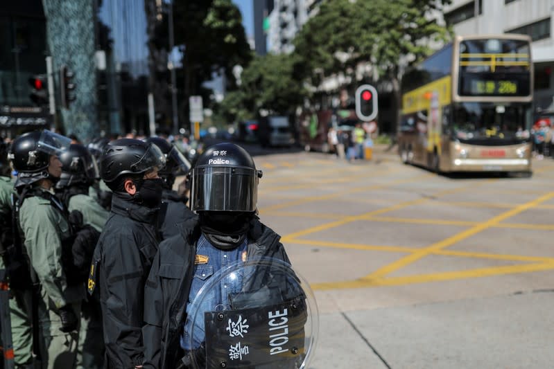 Hong Kong holds its breath ahead of polls amid a lull in violence