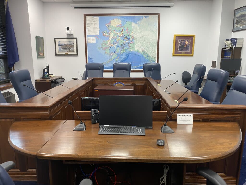 The room where the House Community and Regional Affairs Committee holds its meeting sits empty on March 26, 2024. (Photo by Claire Stremple/Alaska Beacon)