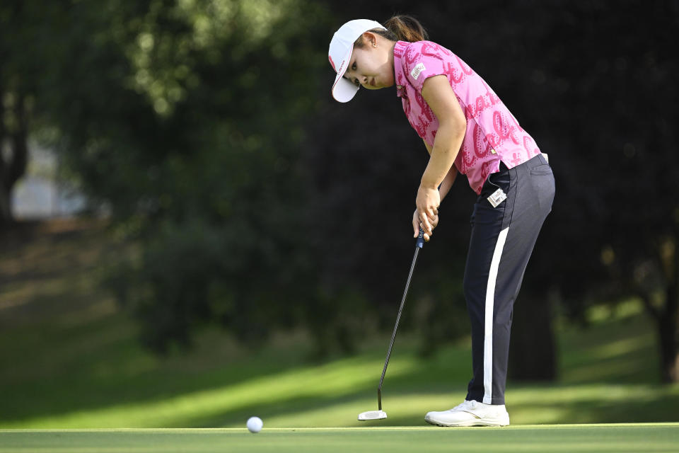 Ayaka Furue, of Japan, hits a shot on the putting green on the first hole during the final round of the LPGA AmazingCre Portland Classic golf tournament in Portland, Ore., Sunday, Sept. 18, 2022. (AP Photo/Troy Wayrynen)