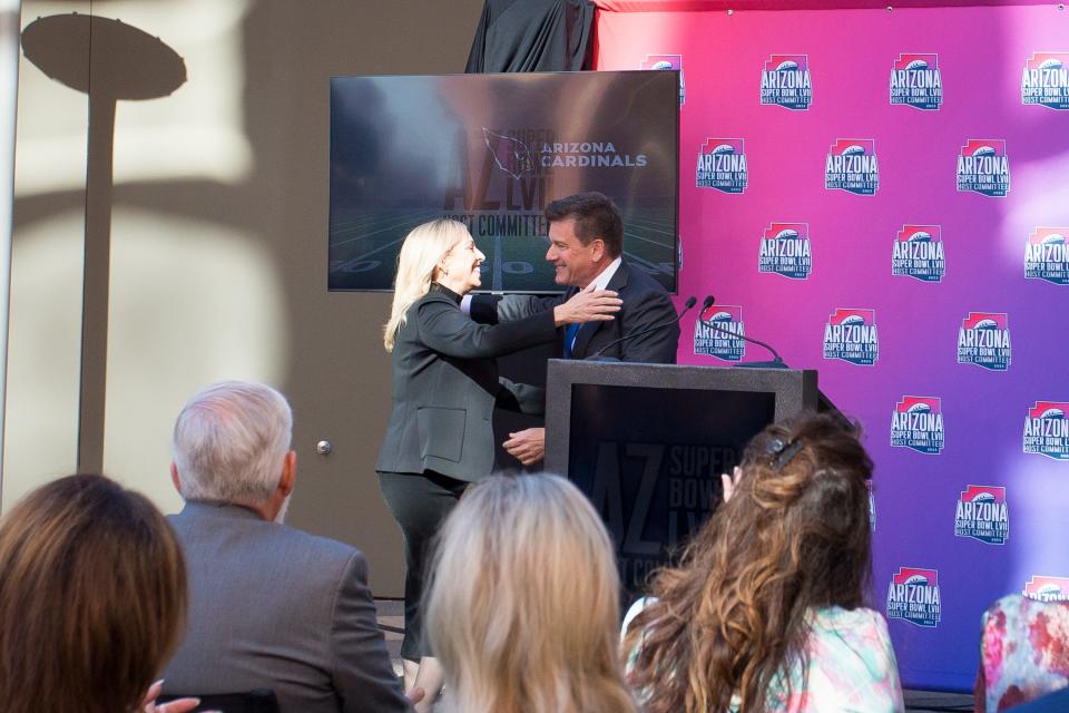 Cardinals owner Micheal Bidwill, right, introduces Jay Perry, left, president and CEO of the Arizona Super Bowl Host Committee, to speak at the committee's press conference on Jan. 24, 2022, in Phoenix.