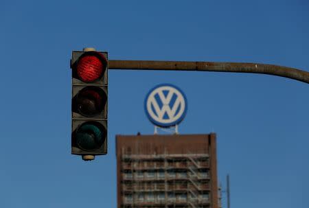 A traffic light shows red next to the Volkswagen factory in Wolfsburg, Germany November 20, 2015. REUTERS/Ina Fassbender