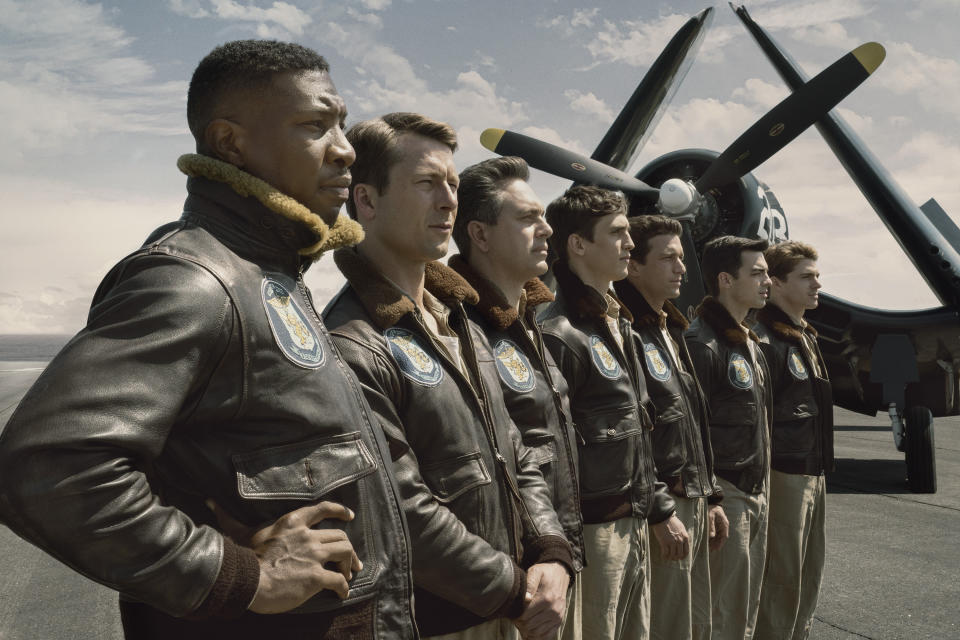 This image released by Sony Pictures shows, from left, Jonathan Majors, Glen Powell, Thomas Sadoski, Nick Hargrove, Daren Kagasoff, Joe Jonas and Spencer Neville in a scene from "Devotion." (Eli Ade/Columbia Pictures-Sony via AP)