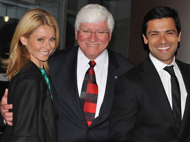 <p>Gilbert Carrasquillo/FilmMagic</p> Kelly Ripa with her father Joseph Ripa and husband Mark Consuelos at the opening of the new Cooper University Patient Pavilion on Dec. 12, 2008 in Camden, New Jersey.