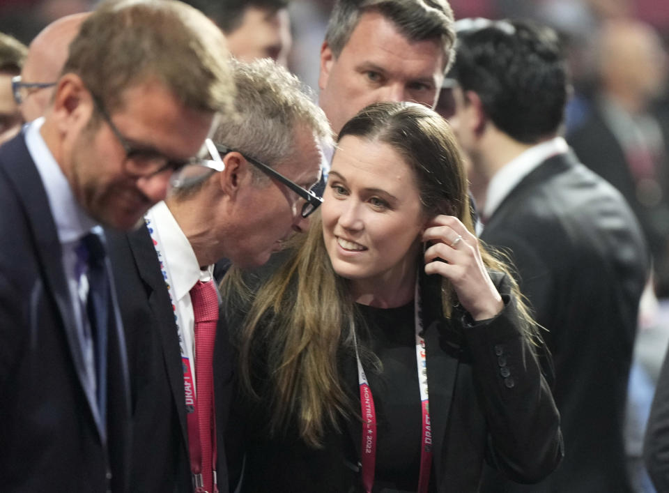 FILE - New Jersey Devils assistant general manager Kate Madigan attends the first round of the NHL hockey draft in Montreal on Thursday, July 7, 2022. At the start of 2022, there were no women serving as assistant general managers in the NHL. Now there are five. (Ryan Remiorz/The Canadian Press via AP, File)