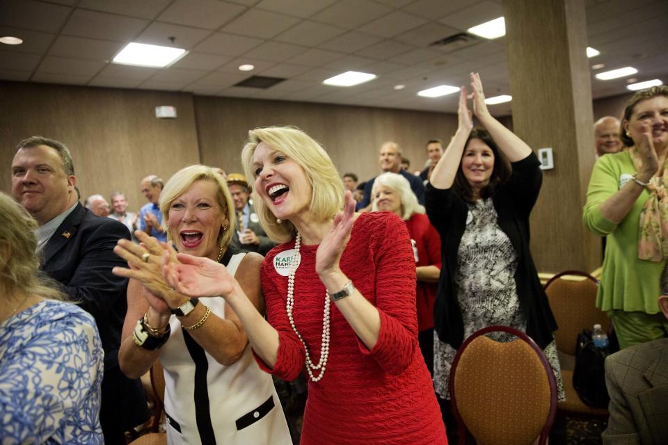 FILE -- Ginger Howard (right) cheers at an election night party in Roswell, Ga., April 18, 2017. Howard, a member of the Republican National Committee from Georgia, is being challenged by candidates in a party election on Saturday, May 18, 2024, who say the national party hasn't done enough to support Donald Trump and protect his supporters. (AP Photo/David Goldman, file)