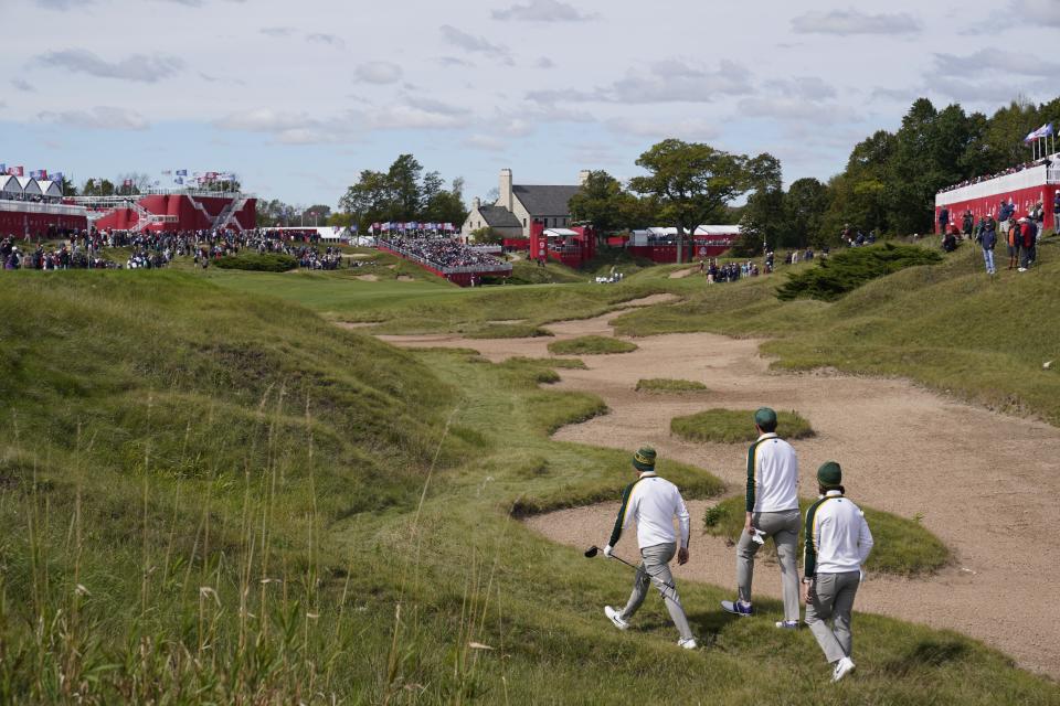 Team Europe's Bernd Wiesberger, Team Europe's Tommy Fleetwood and Team Europe's Viktor Hovland walk up the ninth hole during a practice day at the Ryder Cup at the Whistling Straits Golf Course Wednesday, Sept. 22, 2021, in Sheboygan, Wis. (AP Photo/Jeff Roberson)