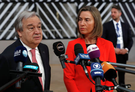 United Nations Secretary General Antonio Guterres and European Union foreign policy chief Federica Mogherini arrive at an international conference on the future of Syria and the region, in Brussels, Belgium, April 5, 2017. REUTERS/Yves Herman