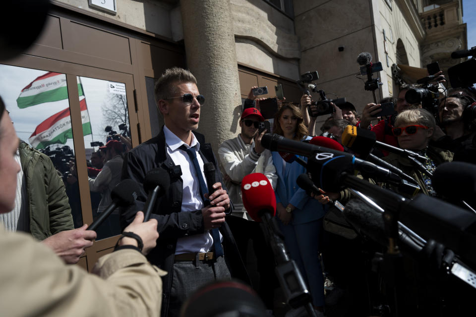 Former Hungarian government insider Peter Magyar addresses journalists outside the Public Prosecutor's office in Budapest, Hungary, on Tuesday March 26, 2024. Magyar on Tuesday released a recording that he claims proves senior officials in the government of Prime Minister Viktor Orbán manipulated court documents to cover up their involvement in a corruption case. (AP Photo/Denes Erdos)