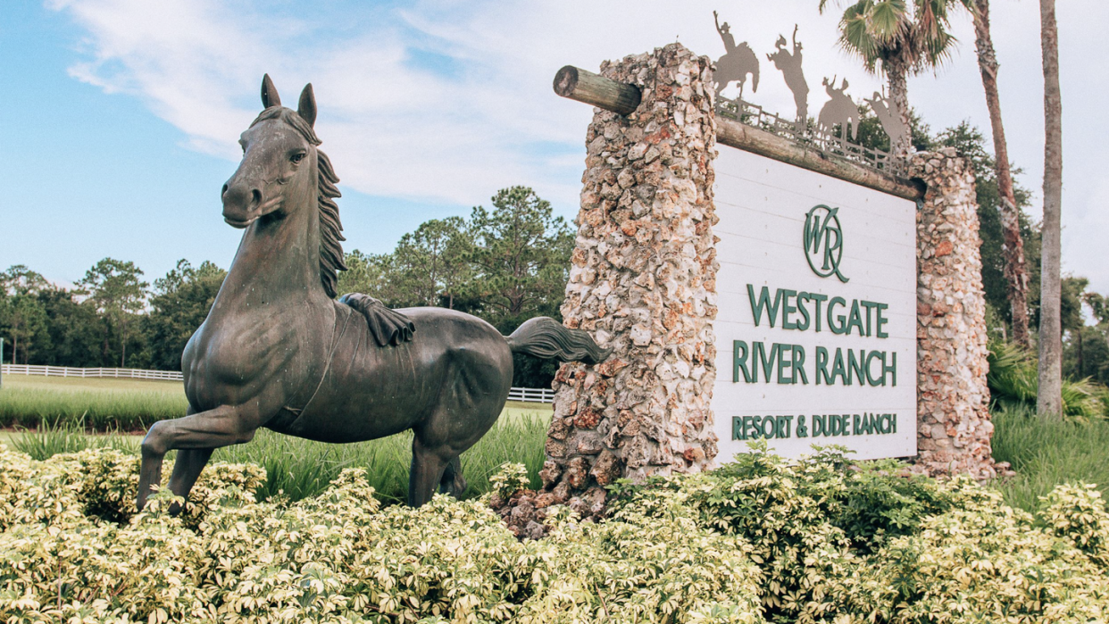 entrance and welcome sign to westgate river ranch