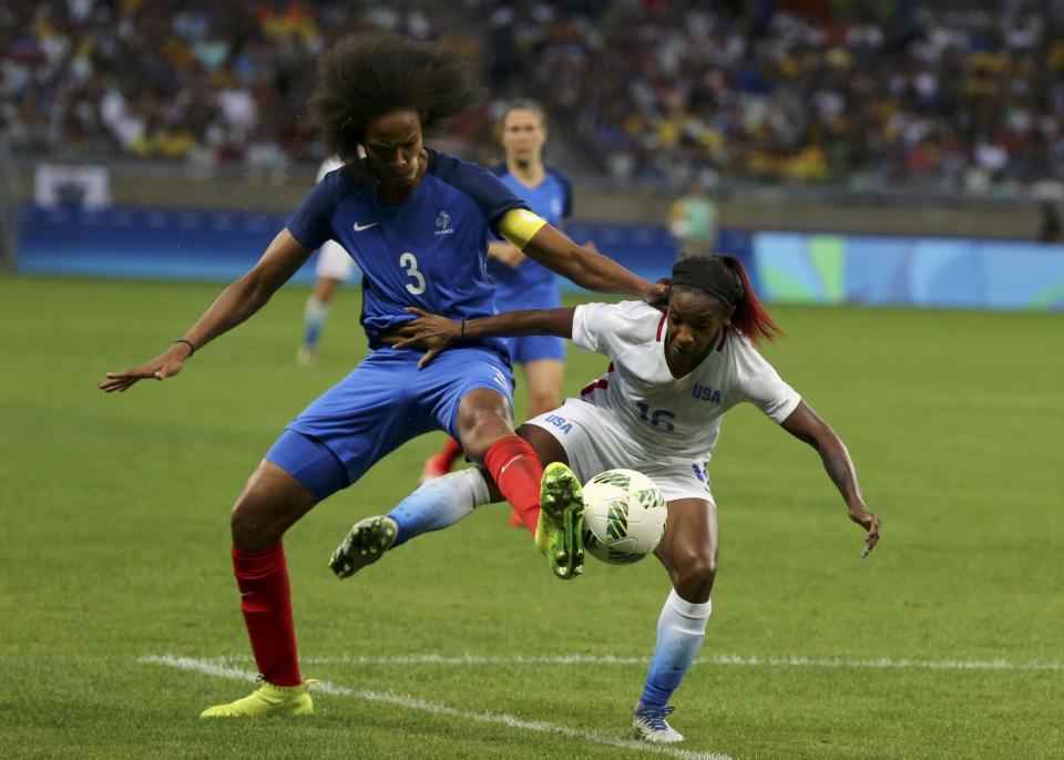 <p>Crystal Dunn (USA) of U.S. and Wendi Renard (FRA) of France in action. REUTERS/Mariana Bazo </p>