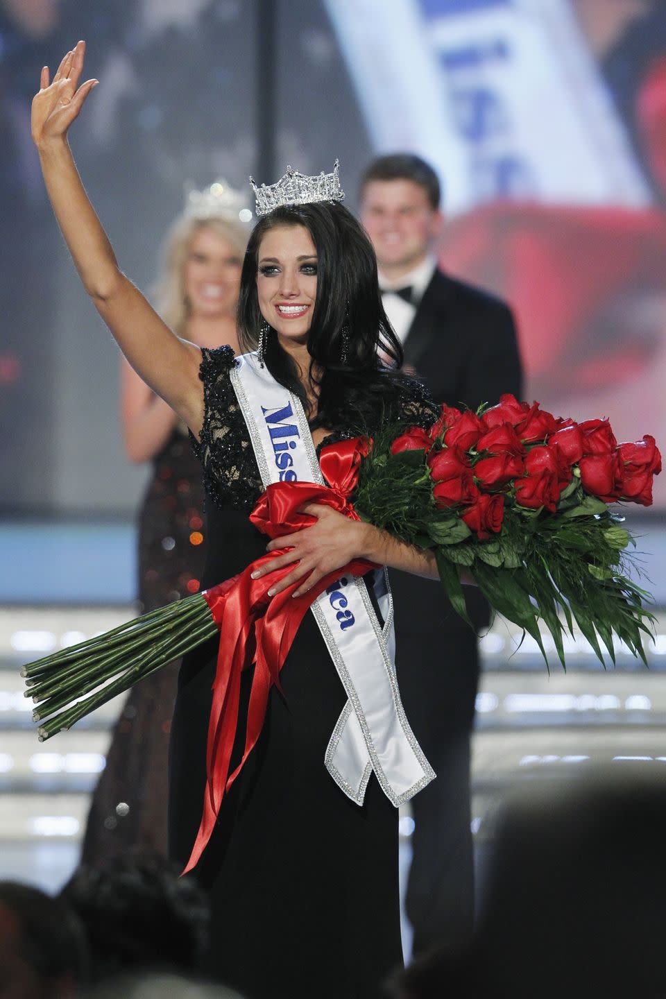 <p>Laura Kaeppeler from Wisconsin's dark eye makeup complimented her black gown when she was chosen as 2012's Miss America. </p>