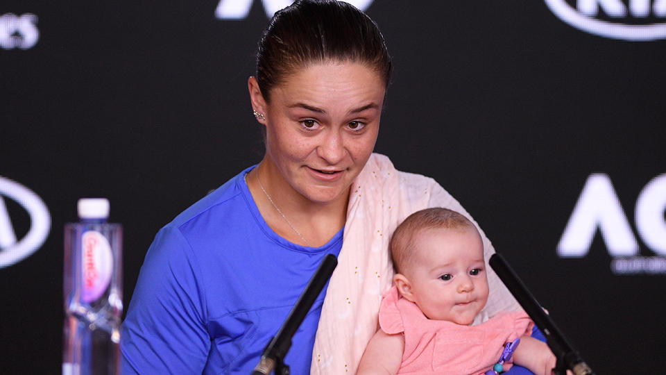 Ash Barty smiling with her niece at the Australian Open semi-final press conference.