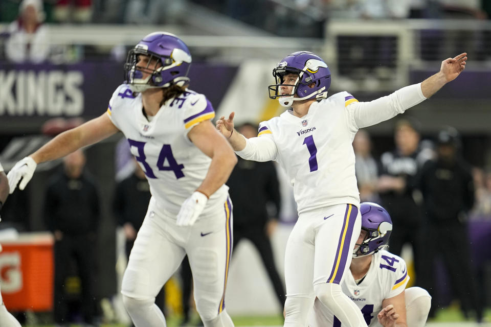 Minnesota Vikings place kicker Greg Joseph (1) watches his 61-yard field goal on the final play of an NFL football game against the New York Giants, Saturday, Dec. 24, 2022, in Minneapolis. The Vikings won 27-24. (AP Photo/Abbie Parr)