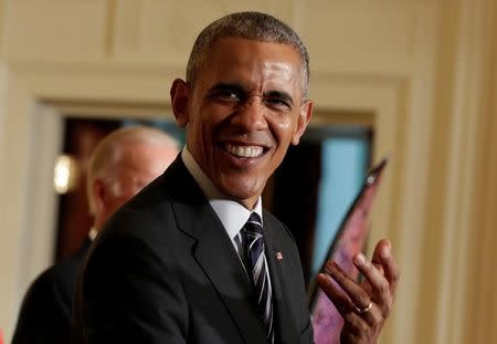 U.S. President Barack Obama welcomes U.S. Olympic and Paralympics teams at the White House in Washington, U.S., September 29, 2016. REUTERS/Yuri Gripas