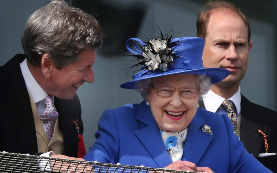 Queen Elizabeth II smiles as she watches The Derby winner come in with her racing manager John Warren (L) and Prince Edward, Earl of Wessex on June 2, 2012  - Getty Images 