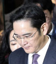 Lee Jae-yong, a vice chairman of Samsung Electronics Co. arrives for the hearing at the Seoul Central District Court in Seoul, South Korea, Wednesday, Jan. 18, 2017. A South Korean court has begun reviewing the arrest of a Samsung Electronics vice chairman who faces allegations of bribery, embezzlement and perjury. (AP Photo/Lee Jin-man)