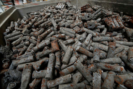FILE PHOTO: Pyrolised Lithium-ion accus of laptops, smartphones and accu-powered craftsmen tools are pictured at the German recycling firm Accurec in Krefeld, Germany, November 16, 2017. REUTERS/Wolfgang Rattay /File Photo