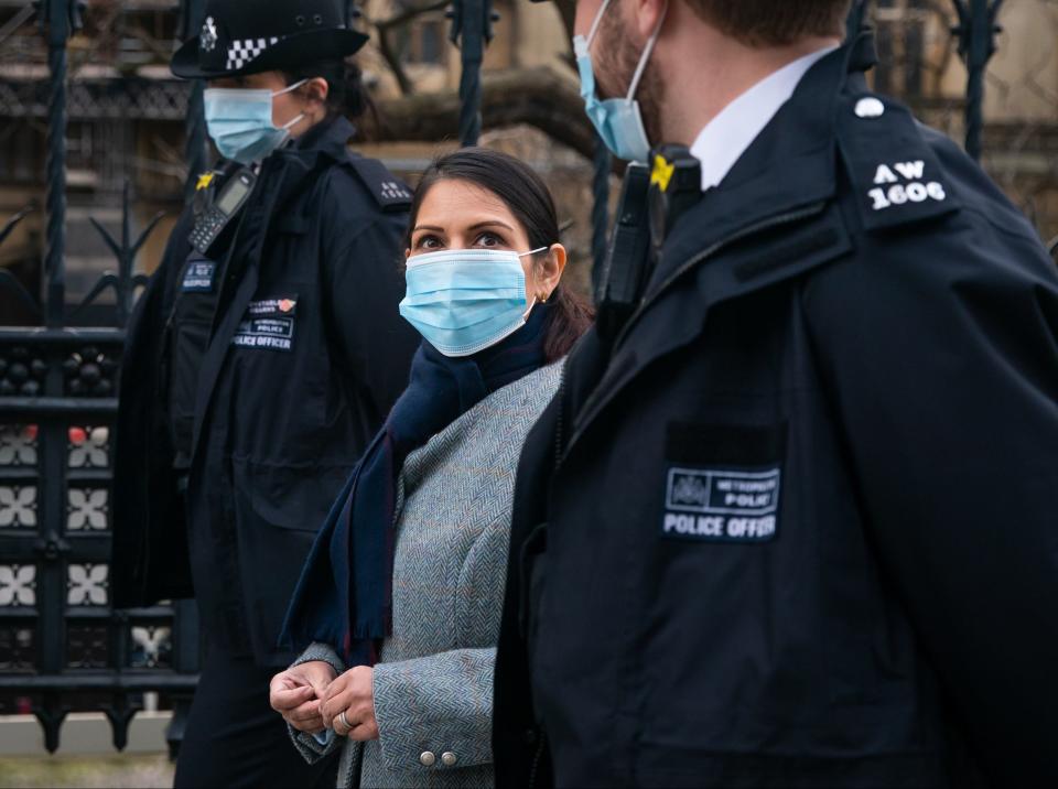 Home Secretary Priti Patel walks towards Westminster Bridge, whilst on patrol with Metropolitan Police officers in central London (PA)