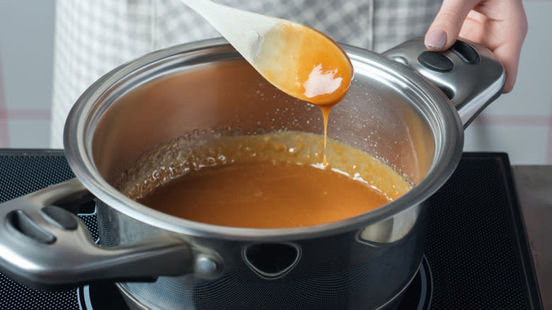 Person making peanut brittle