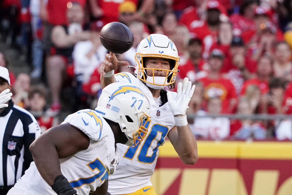 Oct 22, 2023; Kansas City, Missouri, USA; Los Angeles Chargers quarterback Justin Herbert (10) throws a pass against the Kansas City Chiefs during the second half at GEHA Field at Arrowhead Stadium. Mandatory Credit: Denny Medley-USA TODAY Sports