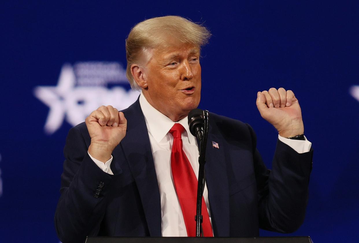 Donald Trump reads off his revenge list at his first post-White House speech during CPAC (Getty Images)