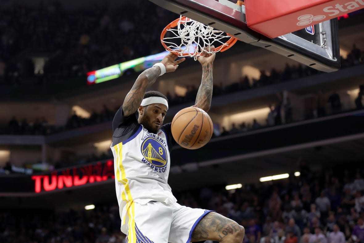 Gary Payton II #8 of the Golden State Warriors dunks the ball against the Sacramento Kings during Game Two of the Western Conference First Round Playoffs at Golden 1 Center on April 17, 2023 in Sacramento, California. (Photo by Ezra Shaw/Getty Images)