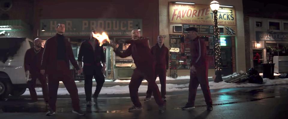 Men wearing red tracksuits in the first trailer for "Hawkeye."