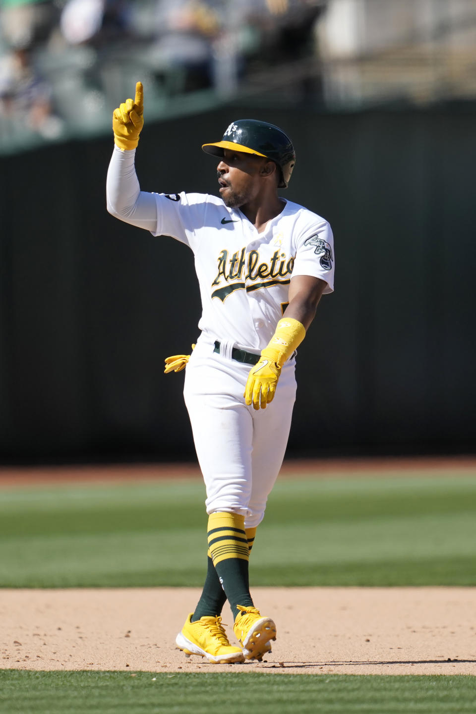 Oakland Athletics' Tony Kemp gestures after hitting a two-run single that scored Ryan Noda and Zack Gelof during the seventh inning of a baseball game against the Los Angeles Angels in Oakland, Calif., Sunday, Sept. 3, 2023. Athletics' Brent Rooker also scored on the play after a throwing error by Angels center fielder Mickey Moniak. (AP Photo/Jeff Chiu)