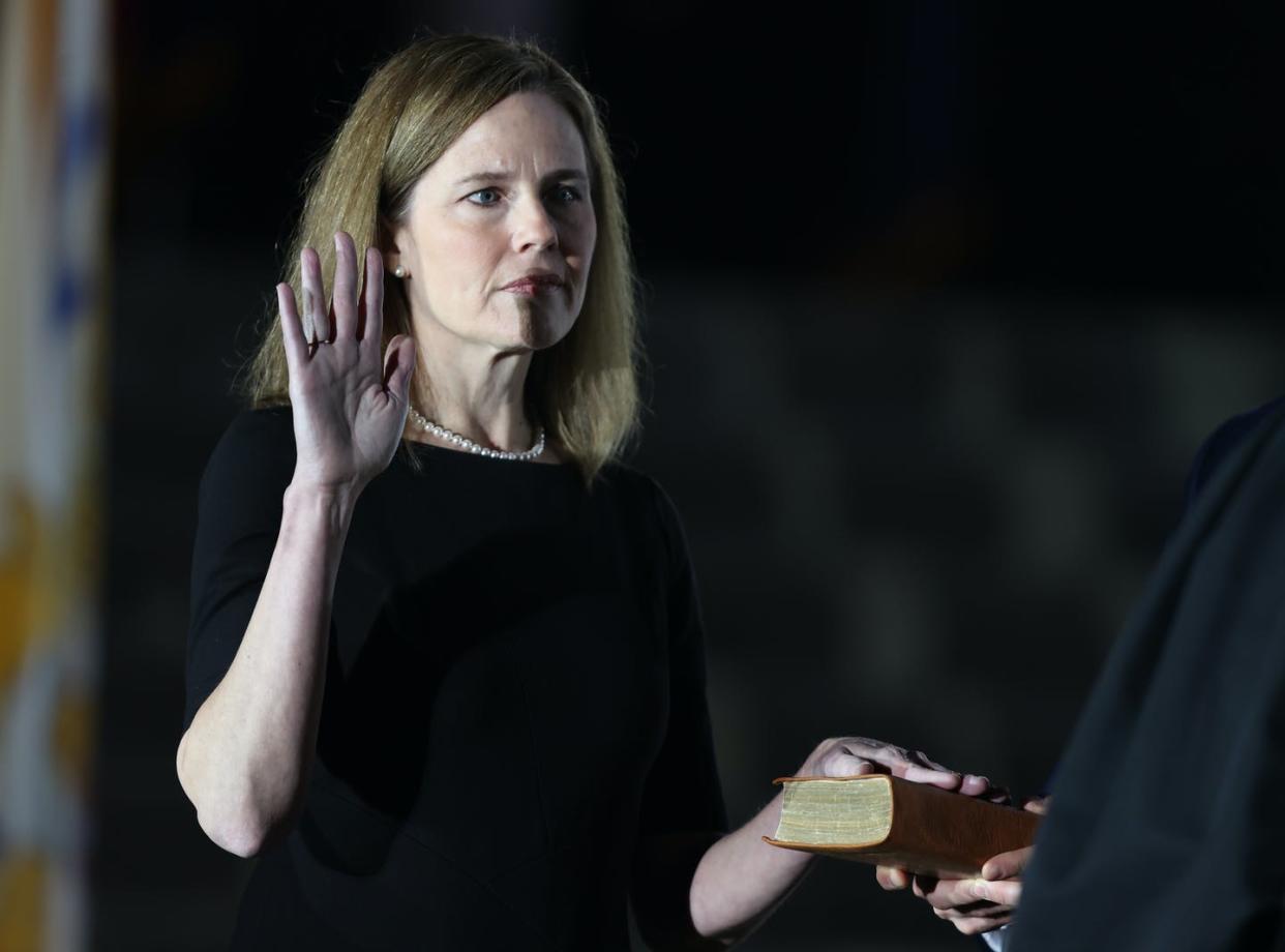 <span class="caption">An early case will test Justice Barrett's credentials as a favorite of religious conservatives.</span> <span class="attribution"><a class="link " href="https://www.gettyimages.com/detail/news-photo/supreme-court-associate-justice-amy-coney-barrett-is-sworn-news-photo/1282403009?adppopup=true" rel="nofollow noopener" target="_blank" data-ylk="slk:Tasos Katopodis/Getty Images;elm:context_link;itc:0;sec:content-canvas">Tasos Katopodis/Getty Images</a></span>