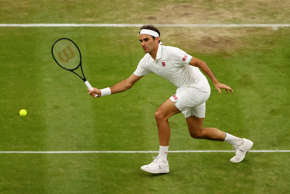 LONDON, ENGLAND - JULY 05: Roger Federer of Switzerland plays a forehand in his Men's Singles Fourth Round match against Lorenzo Sonego of Italy during Day Seven of The Championships - Wimbledon 2021 at All England Lawn Tennis and Croquet Club on July 05, 2021 in London, England. (Photo by Julian Finney/Getty Images)