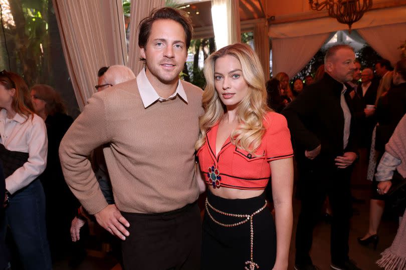 Tom Ackerley and Margot Robbie