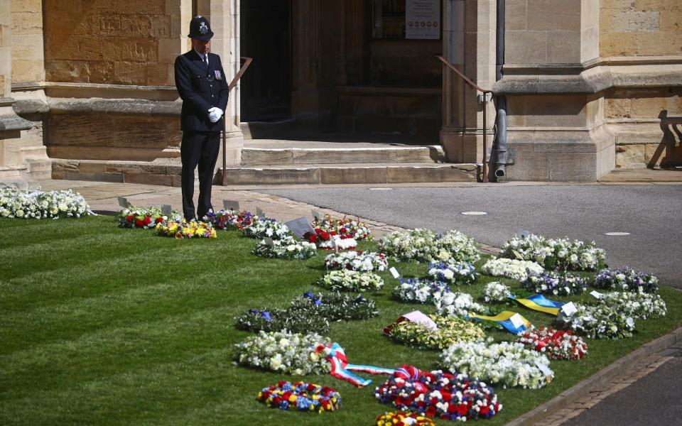 Floral tributes laid out in the grounds of Windsor Castle ahead of the funeral - WPA Pool