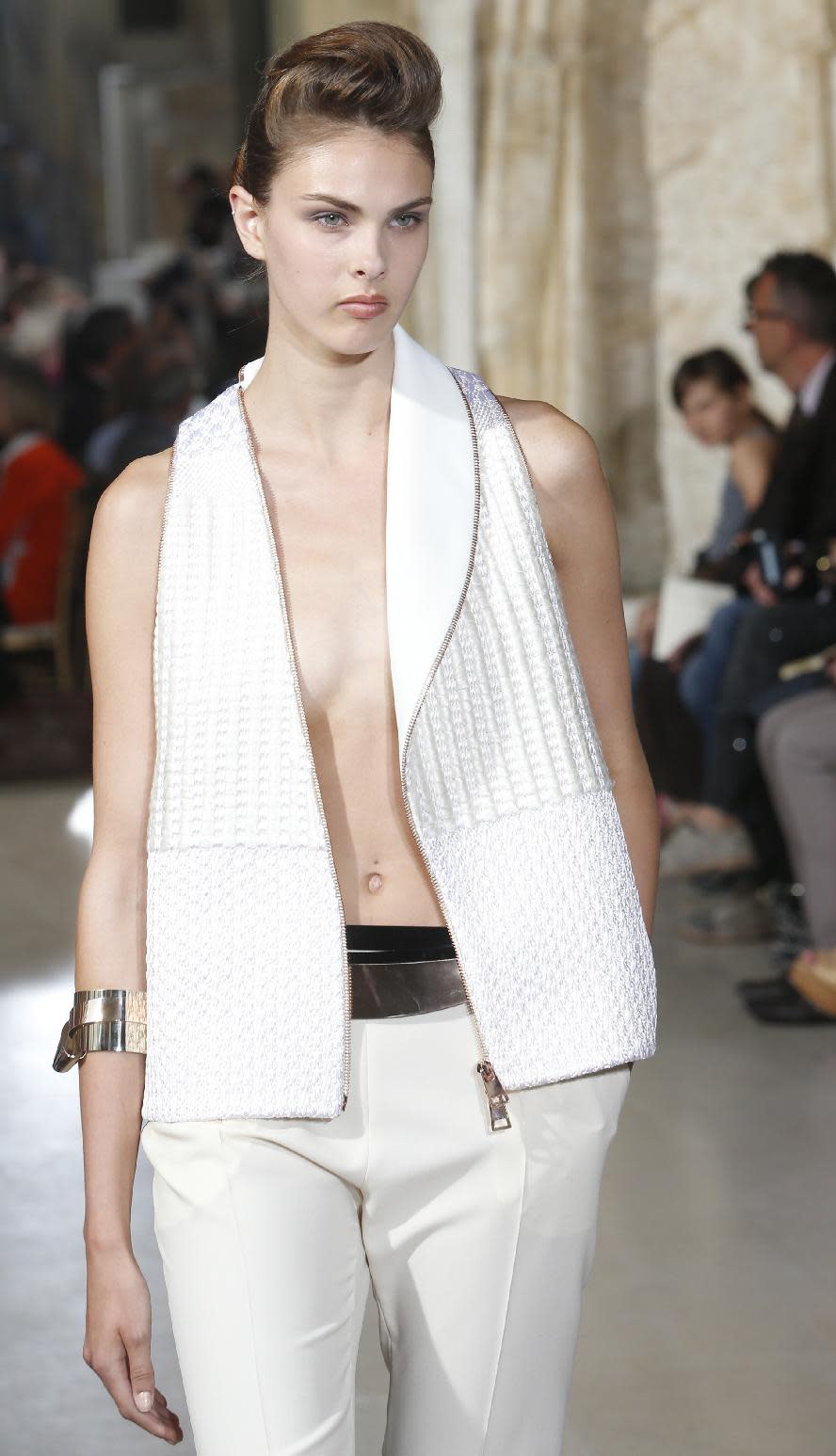 A model wears a creation by fashion designer Bouchra Jarrar during her Women's Fall Winter 2013-2014 haute couture fashion collection presented at Antoine Bourdelle Museum in Paris Tuesday, July 2, 2013 in Paris. (AP Photo/Jacques Brinon)