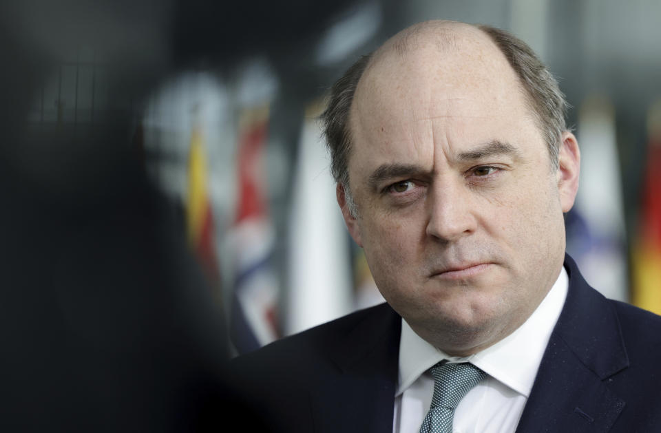 FILE - British Defense Minister Ben Wallace speaks with the media as he arrives for a meeting of NATO defense ministers at NATO headquarters in Brussels, Wednesday, March 16, 2022. British Prime Minister Boris Johnson managed to see off a no-confidence vote from his own Conservative Party — but the result dealt a heavy blow to his authority, and questions are already being asked over who could succeed him. (AP Photo/Olivier Matthys, File)