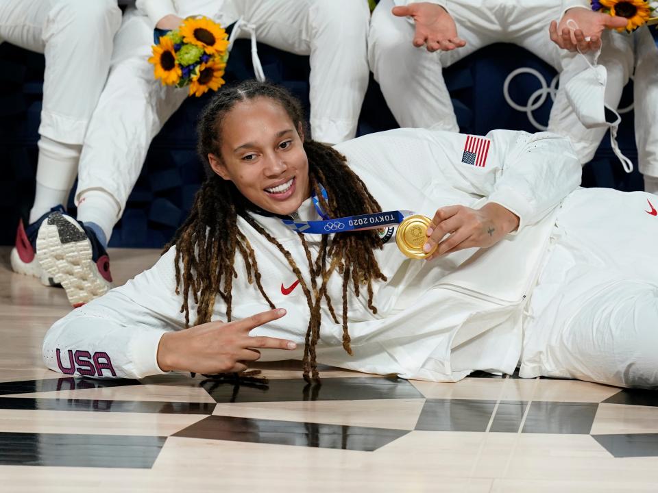 United States's Brittney Griner (15) poses with her gold medal during the medal ceremony for women's basketball at the 2020 Summer Olympics, Sunday, Aug. 8, 2021, in Saitama, Japan.