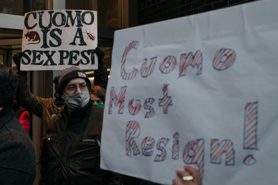 Demonstrators demanding that New York Governor Andrew Cuomo resign from office hold signs and chant at a rally on March 2, 2021 in New York City. (Scott Heins/Getty Images)