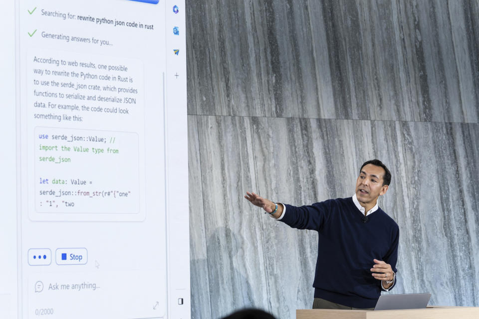 Yusuf Mehdi, Microsoft Corporate Vice President of Search, demonstrates the integration of the Bing search engine and Edge browser with OpenAI on Tuesday, Feb. 7, 2023, in Redmond, Wash. Microsoft is fusing ChatGPT-like technology into its search engine Bing, transforming an internet service that now trails far behind Google into a new way of communicating with artificial intelligence. (AP Photo/Stephen Brashear)