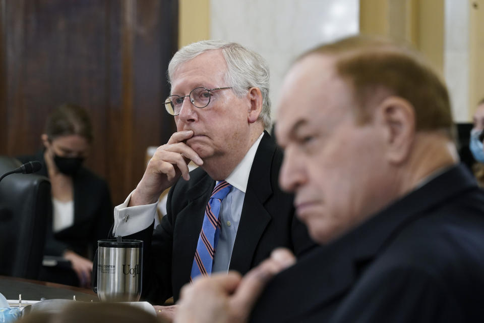 Senate Minority Leader Mitch McConnell, R-Ky., joined at right by Sen. Richard Shelby, R-Ala., listens during a Senate Rules Committee markup on the "For the People Act," which would expand access to voting and other voting reforms, at the Capitol in Washington, Tuesday, May 11, 2021. The bill was already passed by Democrats in the House. (AP Photo/J. Scott Applewhite)