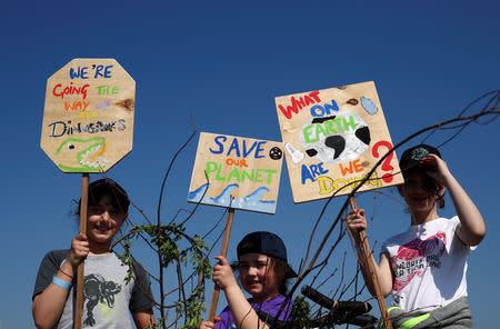 Climate change activists attend the Extinction Rebellion protest in London, Britain April 21, 2019. REUTERS/Hannah McKay