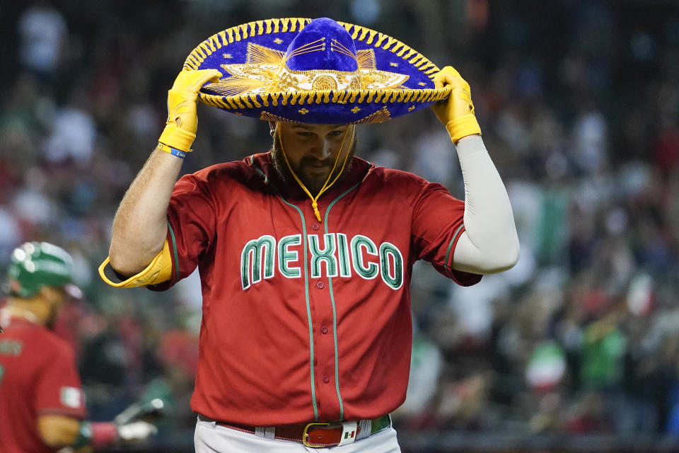 Mexico's Ryan Téllez celebrates after hitting a solo home run against Canada during the eighth inning of a World Baseball Classic game in Phoenix, Wednesday, March 15, 2023. (AP Photo/Godofredo A. Vásquez)