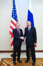 U.S. National Security Adviser John Bolton, left, and Russian Security Council chairman Nikolai Patrushev pose for a photo prior their official talks in Moscow, Russia, Monday, Oct. 22, 2018. Bolton met with Patrushev to discuss a broad range of issues including arms control agreements, Syria, Iran, North Korea and the fight against terrorism.(Press Service of the Russian Security Council via AP)